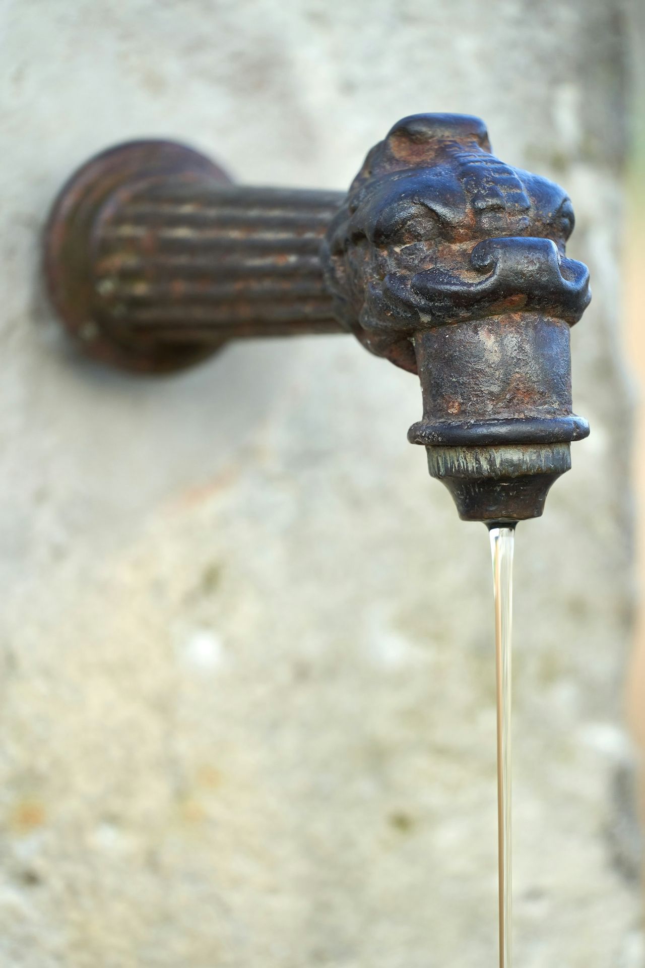 a faucet with water running out of it